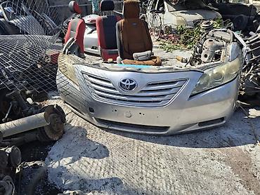 xv40: Передний бампер в сборе для Toyota Camry (кузов XV40, дорестайлинг — 2