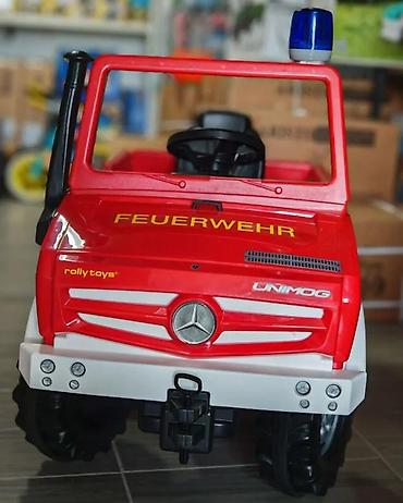 brod igracka za decu: Dečje vozilo na pedale – Mercedes-Benz Unimog vatrogasno vozilo (Rolly — 8