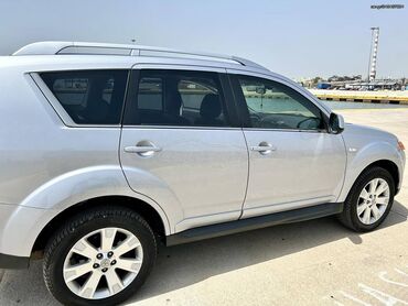 Mitsubishi: Mitsubishi Outlander: 2.3 l. | 2009 έ. 75000 km. SUV/4x4 — 7