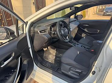 byd e2: Toyota Corolla: 2021 г., 1.8 л, Вариатор, Гибрид, Седан — 9