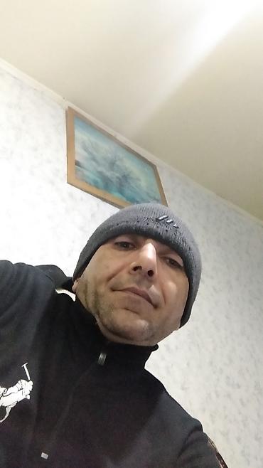 Kişi geyimləri: Qış papağı – boz rəngli, toxunma beani tipli - Rəng: tünd boz - — 1