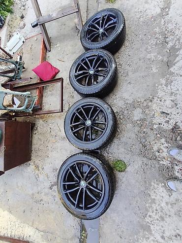 70 se: Комплект из 4 колес BMW: литые диски + шины. - Диски: черные — 2