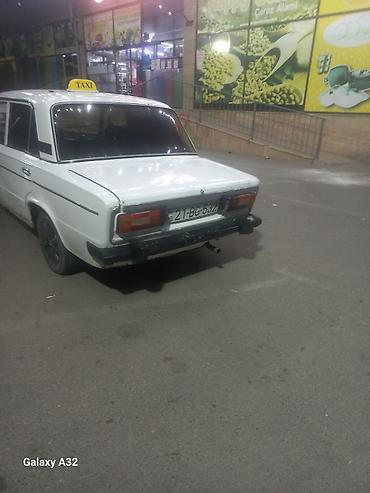 opel astra k: Ağ rəngli VAZ 2106 sedan – klassik model. Şəhər içi sərnişin — 1