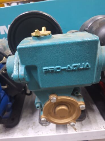 насосы для аквариума: Насос PRO-AQUA, выполненный в бирюзовом цвете, предназначен для