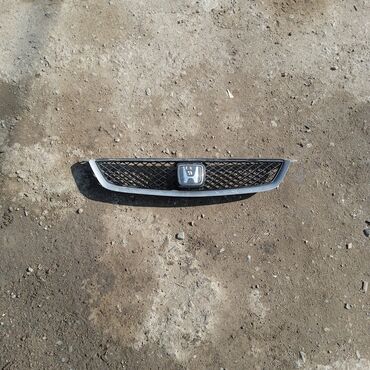 Решетки радиатора: Решетка радиатора Mazda Б/у — 2