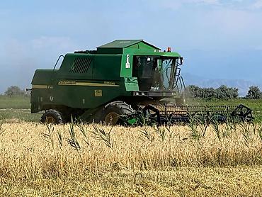 с поля: Комбайн зерноуборочный John Deere STS (Hi-Performance Rotor)9880 — 5