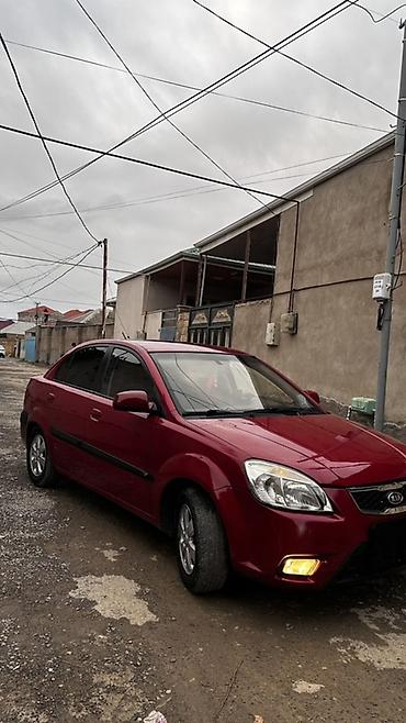 90 fa 373: Kia Rio: 1.4 l | 2010 il Sedan — 5