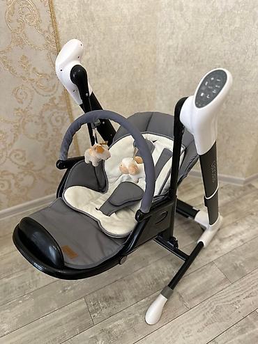 Стульчики для кормления: Продается в отличном состоянии детское кресло качалка в три в одном — 9