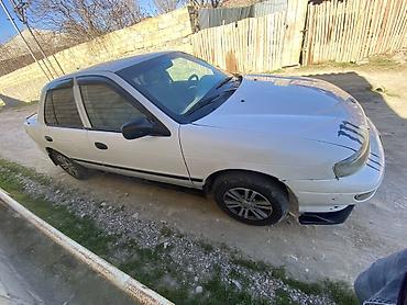 Kia: Kia Sephia: 1.5 l | 1997 il Sedan — 2