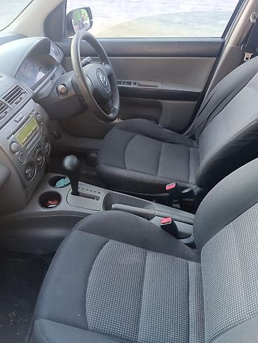 2 8: Mazda Demio: 2004 г., 1.5 л, Автомат, Бензин — 5