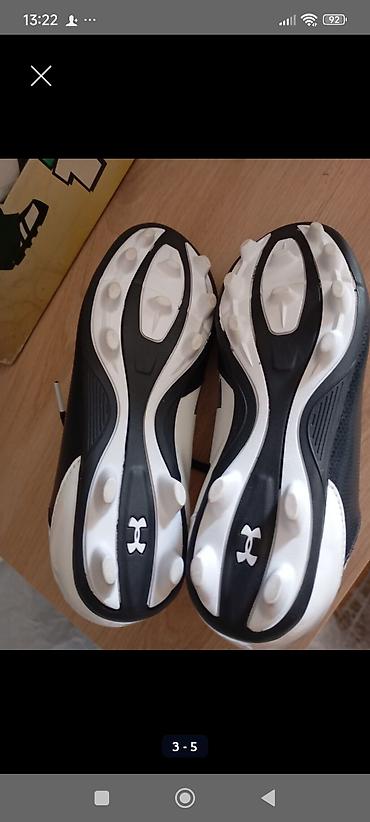 puma crna: Under Armour kopačke za fudbal – crno‑bele 32/gaz20cm - Model sa — 3
