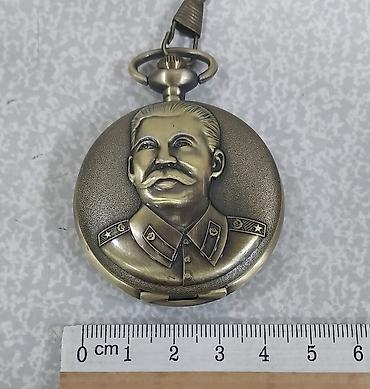 rusiyada saat necedi: Stalin cib saatı kisə saatı relyef portretli, qapaqlı model — 8
