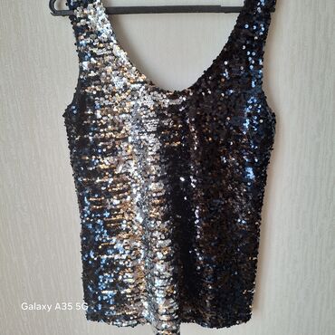 Köynək və bluzalar: 12m xer biri tezedi. 3 deneden cox alana 10m vererem.Qadın köynəkləri — 10