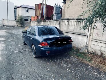 Mitsubishi: Mitsubishi Lancer: 2004 г., 1.6 л, Механика, Бензин, Седан