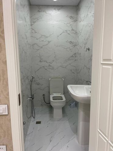 Uzunmüddətli kirayə mənzillər: Nərimanov rayonu Nərimanov metrosunun yaxınlığında yeni tikili yaşayış — 14