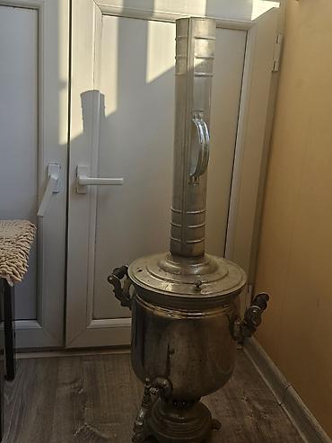 samovar tarixi: Kömür/odunla işləyən metal samovar. 3-4 dəfə işlənib. 5 litr su — 2