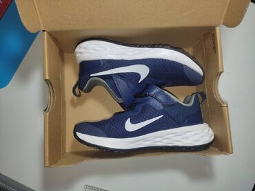 спортивные костюмы для мальчиков 12 лет: Кроссовки Nike REVOLUTION 6 NN (PSV) / Синий, оригинальные, новые не