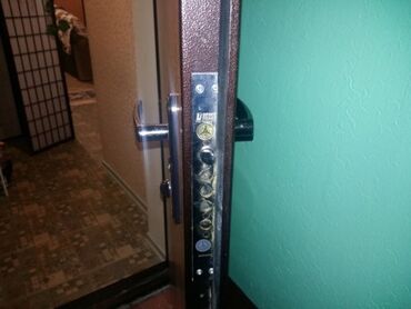 Qapıların təmiri: Çilingər xidməti Qapı usta Qapı ustası Qapıların təmiri Üzlənməsi — 8