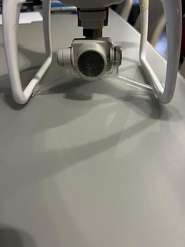 Дроны: DJI Phantom (серия Phantom 4) квадрокоптер с камерой и стабилизатором — 5