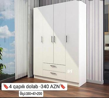 Ağ rəngdə, minimal dizaynlı 4 qapılı geyim dolabı. Praktik saxlama