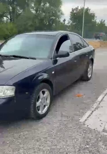 арзан баада машиналар: Элегантный седан Audi A6 черного цвета с характерным дизайном