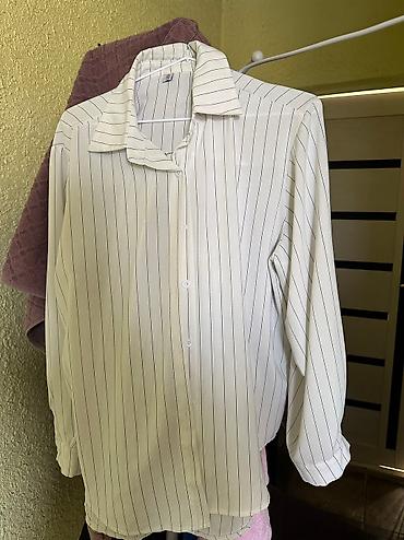di box: Женские рубашки 
2xl
Мне велика 
А так классные рубашки — 9