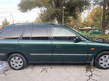 mazda 9: Mazda Capella: 2000 г., 2 л, Механика, Бензин, Универсал — 5