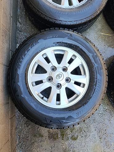 bud e9: Комплект из 4 колес в сборе: литые диски Toyota + зимние шины — 4