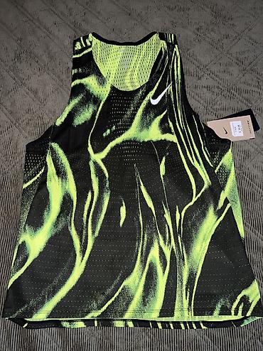 helanke 8: NIKE AeroSwift Men's Dri-FIT ADV Running Vest Vel. S NOVO
HV2643 702 — 5