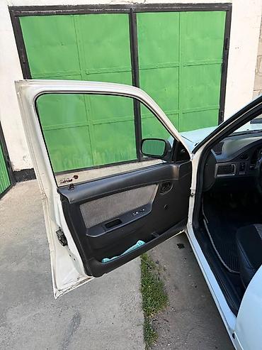 n150: Daewoo Nexia: 2010 г., 1.6 л, Механика, Бензин, Седан — 6