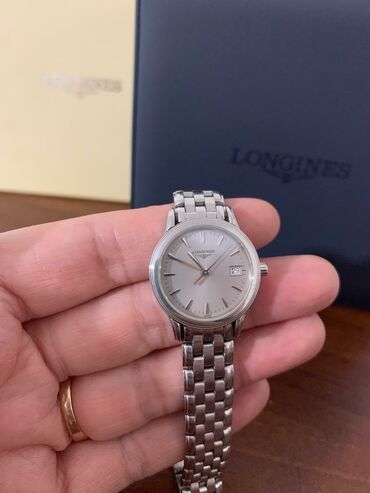 плащ для дождя: Швейцарские часы от бренда "Longines" из коллекции "flagship". Корпус