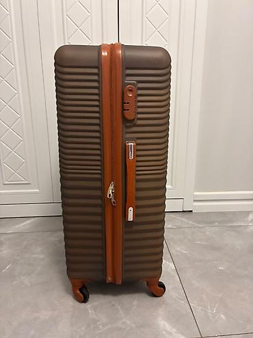 İdman və istirahət: Böyük ölçülü sərt korpuslu səyahət çantası (suitycase) - Rəng — 1
