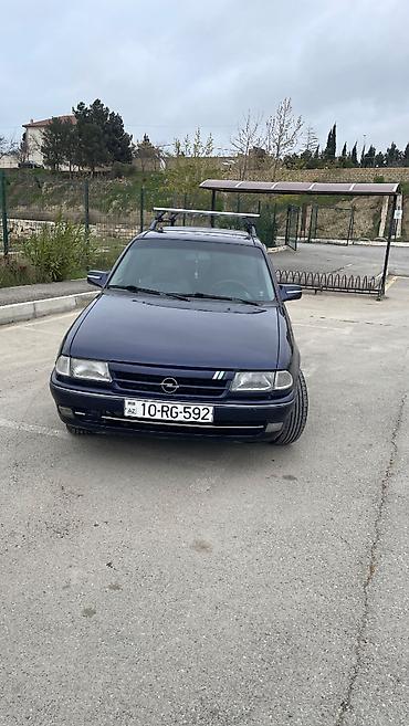 e39 rul: Opel Astra F Caravan (universa) – tünd mavi rəngdə, nömrə 10-RG-592 — 1