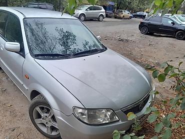 2 8: Mazda 323: 2003 г., 1.6 л, Механика, Бензин, Седан — 1