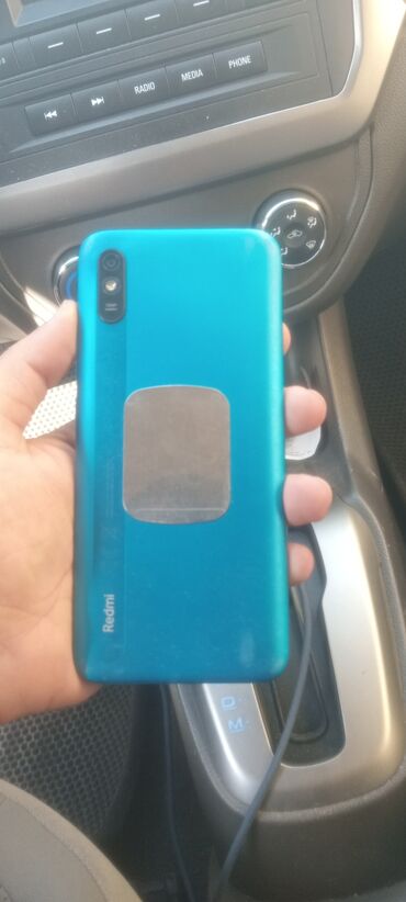 en ucuz telfon: Redmi 9A, 32 ГБ, цвет - Синий, Сенсорный