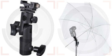 сниму кронштейн: Кронштейн на стойку для вспышки и зонта. 
Материал - алюминий
