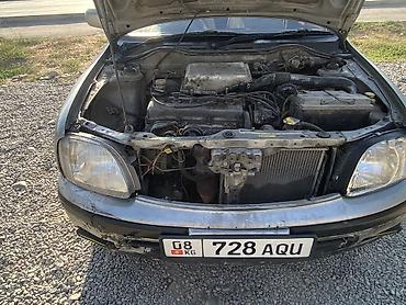 бартавой сапог: Nissan March: 2000 г., 1.3 л, Автомат, Бензин, Универсал — 10