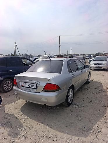 mitsubishi karisma: Mitsubishi Lancer: 2002 г., 1.6 л, Автомат, Газ, Седан — 5