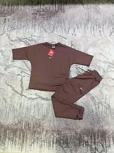 kappa elastin: Komplet majica 3/4 rukava i donji deo trenerke. - Model: jednobojni — 2
