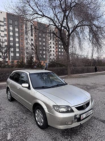 shevrolet lacetti: Mazda 323: 2002 г., 1.6 л, Автомат, Бензин, Универсал — 2