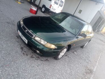 эвакуатор кочкор: Mazda Cronos: 1995 г., 1.8 л, Механика, Бензин, Седан