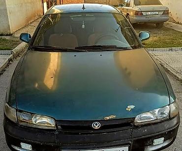 smart open: Mazda 626: 1992 г., 1.8 л, Механика, Бензин, Хэтчбэк — 1