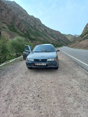изготовление чип ключа для автомобиля: Nissan Primera: 1991 г., 1.6 л, Механика, Бензин, Седан