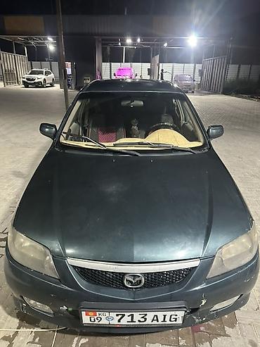 мата секыл: Mazda 323: 2002 г., 1.6 л, Автомат, Бензин, Хетчбек — 4