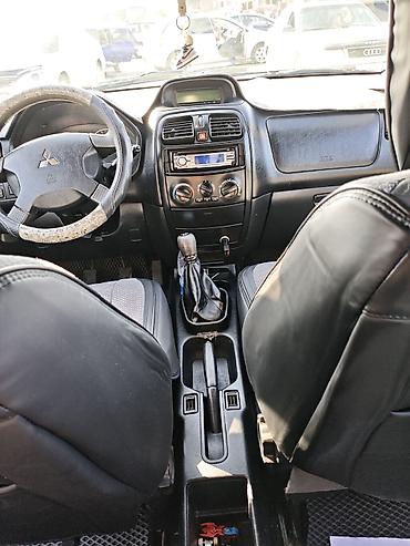 Mitsubishi: Mitsubishi : 2004 г., 1.6 л, Механика, Бензин, Минивэн — 4