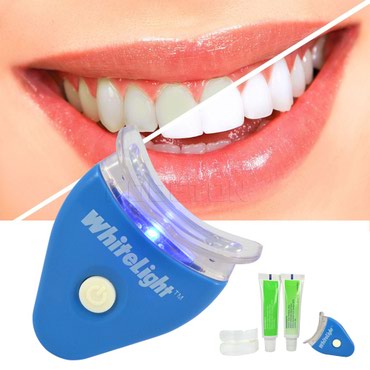 стоматологические услуги: Отбеливатель зубов Секрет отбеливания зубов системой White Light