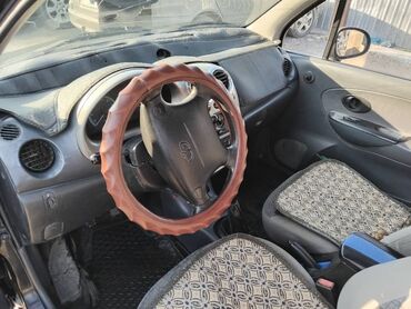 автомашина магнус: Автомобиль Daewoo Matiz черного цвета, компактный хэтчбек с пятью