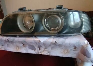 Yağlar və avtokimyəvi maddələr: Sol, Yaxın və uzaq vuran işıqlar BMW, 2001 il, Orijinal, Almaniya, İşlənmiş