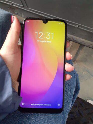 Xiaomi: Xiaomi Redmi 7, 16 GB, rəng - Qara, 
 Barmaq izi, İki sim kartlı