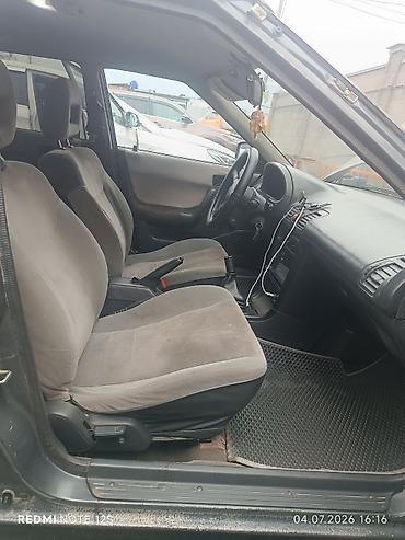 Mazda: Mazda 323: 1991 г., 1.6 л, Механика, Бензин, Хэтчбэк — 10